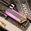 RGB SSD mounted on a motherboard, showcasing a sleek design with vibrant lighting effects.